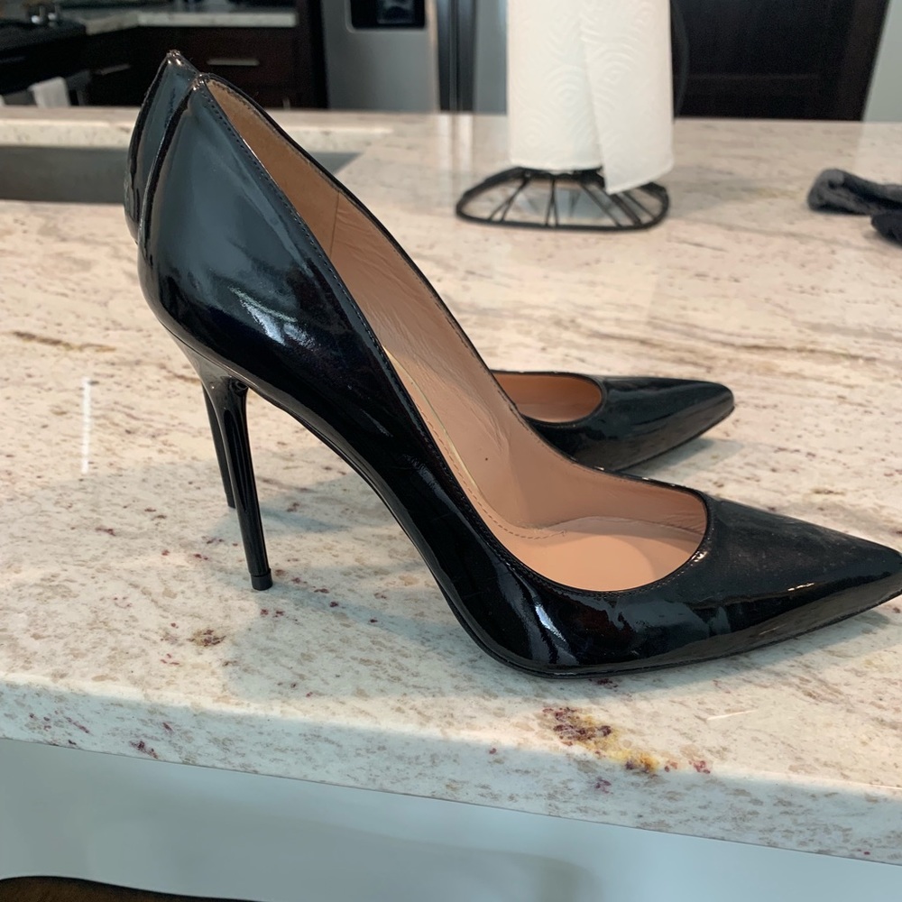 Stuart Weitzman black patent leather pumps